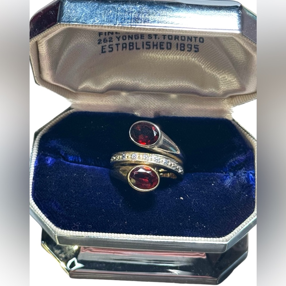 lovely sterling & gold plt Garnet with diamonds twist ring